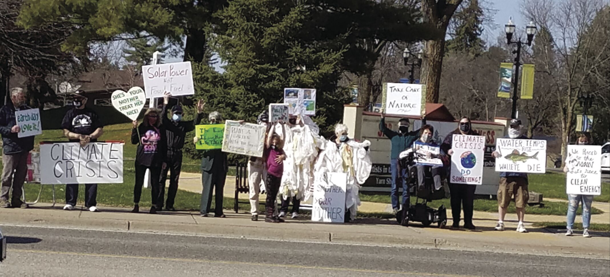 Grand Rapids Area Earth Circle celebrates 51st Earth Day on April 22Submitted photo Members of Grand Rapids Area Earth Circle and supporters gathered on the sidewalk by Central School on the 51st anniversary of Earth Day, April 22, 2021, to show support for the Earth and the need to care for our land, water, and air.